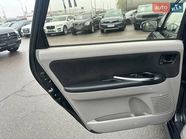 Черный Мицубиси Грандис, объемом двигателя 2.4 л и пробегом 212 тыс. км за 5300 $, фото 25 на Automoto.ua