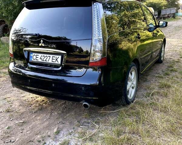 Черный Мицубиси Грандис, объемом двигателя 2 л и пробегом 300 тыс. км за 6350 $, фото 2 на Automoto.ua