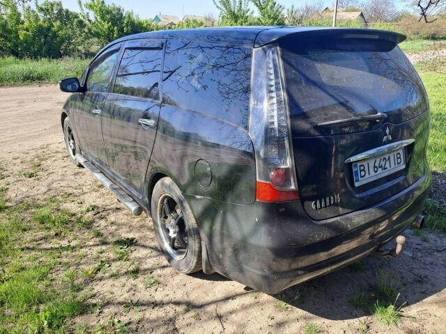 Чорний Міцубісі Грандіс, об'ємом двигуна 2 л та пробігом 280 тис. км за 2427 $, фото 2 на Automoto.ua