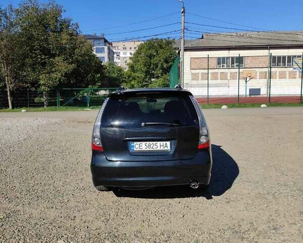 Черный Мицубиси Грандис, объемом двигателя 2.38 л и пробегом 269 тыс. км за 4299 $, фото 8 на Automoto.ua