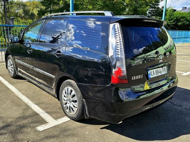 Черный Мицубиси Грандис, объемом двигателя 2.4 л и пробегом 242 тыс. км за 3900 $, фото 4 на Automoto.ua