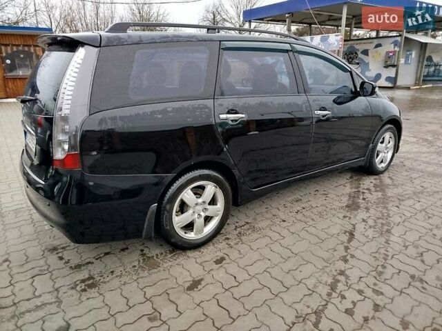 Чорний Міцубісі Грандіс, об'ємом двигуна 2.4 л та пробігом 422 тис. км за 5450 $, фото 6 на Automoto.ua