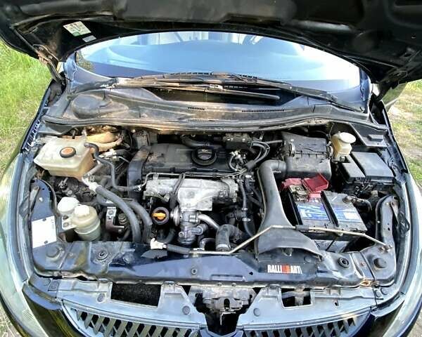 Черный Мицубиси Грандис, объемом двигателя 2 л и пробегом 300 тыс. км за 6350 $, фото 4 на Automoto.ua