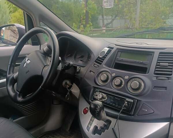 Чорний Міцубісі Грандіс, об'ємом двигуна 2.4 л та пробігом 270 тис. км за 6200 $, фото 29 на Automoto.ua