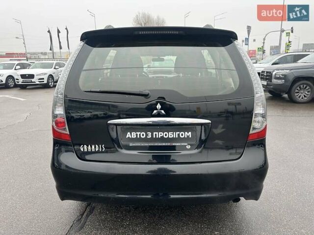 Черный Мицубиси Грандис, объемом двигателя 2.4 л и пробегом 212 тыс. км за 5300 $, фото 5 на Automoto.ua