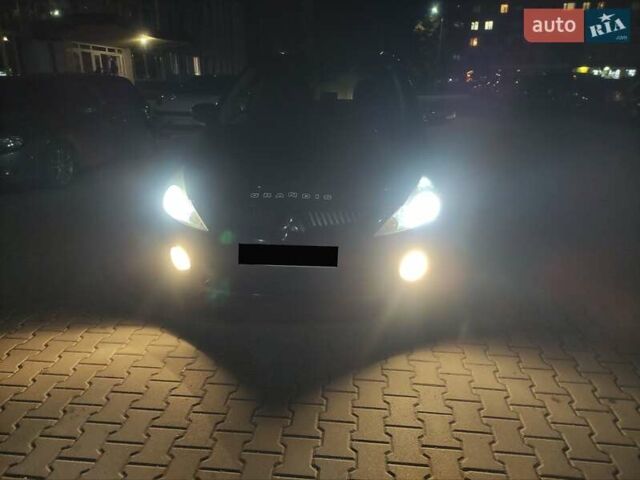 Черный Мицубиси Грандис, объемом двигателя 2 л и пробегом 309 тыс. км за 5400 $, фото 2 на Automoto.ua