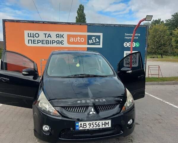 Чорний Міцубісі Грандіс, об'ємом двигуна 2.4 л та пробігом 144 тис. км за 7300 $, фото 1 на Automoto.ua