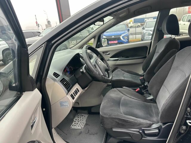 Черный Мицубиси Грандис, объемом двигателя 2.4 л и пробегом 212 тыс. км за 5300 $, фото 10 на Automoto.ua