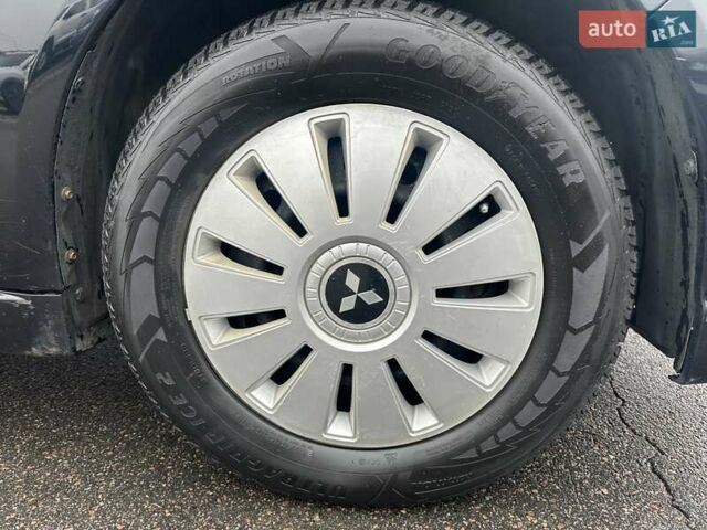 Черный Мицубиси Грандис, объемом двигателя 2.4 л и пробегом 212 тыс. км за 5300 $, фото 12 на Automoto.ua