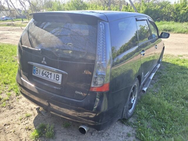 Черный Мицубиси Грандис, объемом двигателя 2 л и пробегом 280 тыс. км за 2384 $, фото 3 на Automoto.ua