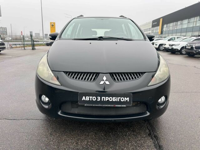 Черный Мицубиси Грандис, объемом двигателя 2.4 л и пробегом 212 тыс. км за 5300 $, фото 1 на Automoto.ua