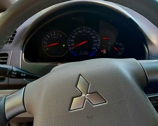 Черный Мицубиси Грандис, объемом двигателя 2.4 л и пробегом 326 тыс. км за 5500 $, фото 11 на Automoto.ua