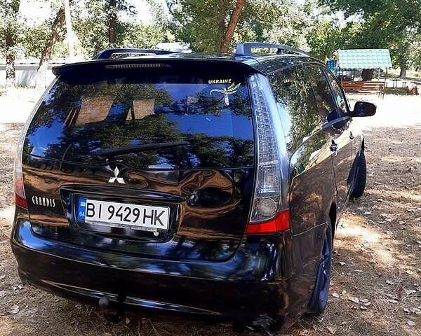 Черный Мицубиси Грандис, объемом двигателя 2.4 л и пробегом 326 тыс. км за 5500 $, фото 3 на Automoto.ua
