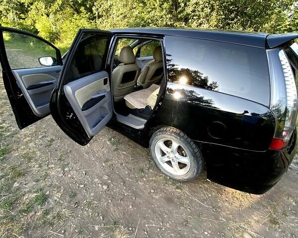 Черный Мицубиси Грандис, объемом двигателя 2 л и пробегом 300 тыс. км за 6350 $, фото 6 на Automoto.ua