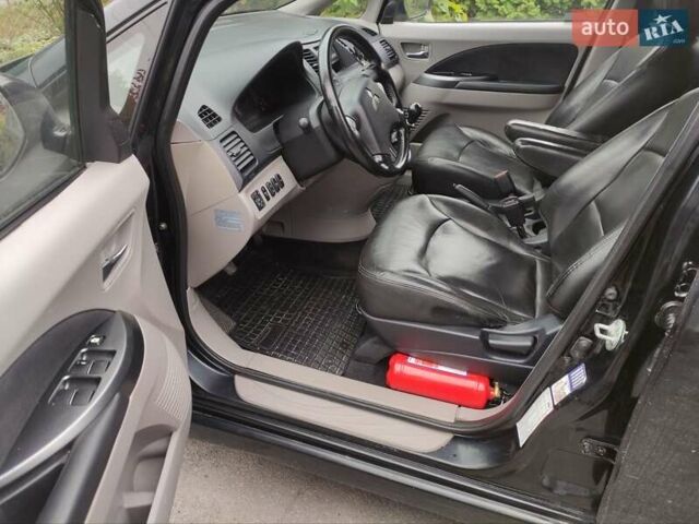 Черный Мицубиси Грандис, объемом двигателя 2 л и пробегом 309 тыс. км за 5400 $, фото 17 на Automoto.ua