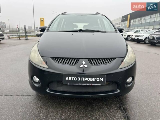 Черный Мицубиси Грандис, объемом двигателя 2.4 л и пробегом 212 тыс. км за 5300 $, фото 1 на Automoto.ua
