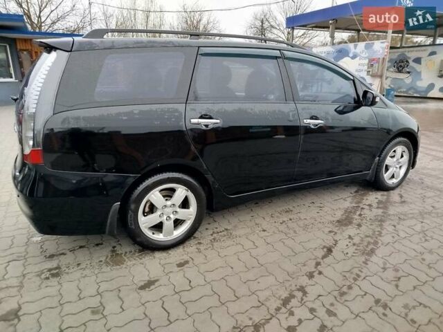 Чорний Міцубісі Грандіс, об'ємом двигуна 2.4 л та пробігом 422 тис. км за 5450 $, фото 5 на Automoto.ua