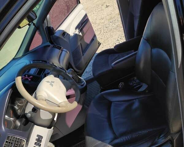 Черный Мицубиси Грандис, объемом двигателя 2.38 л и пробегом 269 тыс. км за 4299 $, фото 15 на Automoto.ua