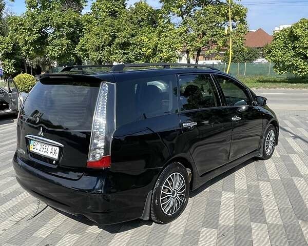 Чорний Міцубісі Грандіс, об'ємом двигуна 2.38 л та пробігом 300 тис. км за 6000 $, фото 3 на Automoto.ua
