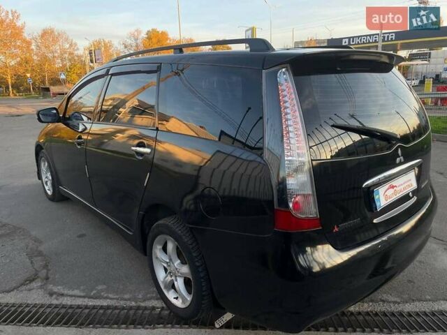 Черный Мицубиси Грандис, объемом двигателя 2.38 л и пробегом 197 тыс. км за 5299 $, фото 3 на Automoto.ua