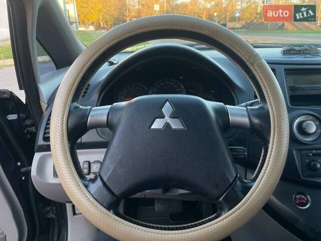 Черный Мицубиси Грандис, объемом двигателя 2.38 л и пробегом 197 тыс. км за 5299 $, фото 13 на Automoto.ua