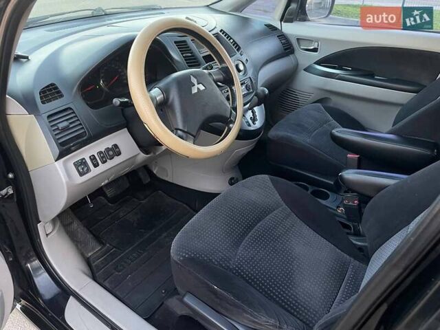 Черный Мицубиси Грандис, объемом двигателя 2.38 л и пробегом 197 тыс. км за 5299 $, фото 12 на Automoto.ua
