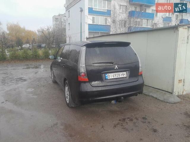 Черный Мицубиси Грандис, объемом двигателя 2.38 л и пробегом 350 тыс. км за 5350 $, фото 3 на Automoto.ua