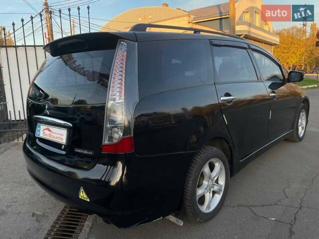 Черный Мицубиси Грандис, объемом двигателя 2.38 л и пробегом 197 тыс. км за 5299 $, фото 5 на Automoto.ua