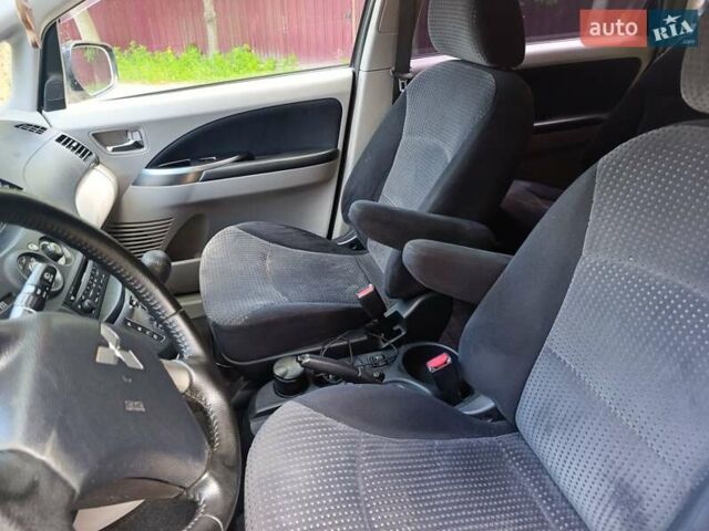 Черный Мицубиси Грандис, объемом двигателя 2.4 л и пробегом 216 тыс. км за 6300 $, фото 81 на Automoto.ua