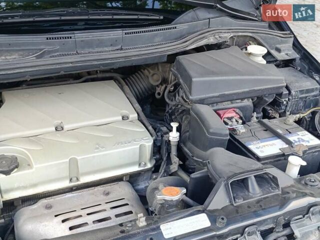 Черный Мицубиси Грандис, объемом двигателя 2.4 л и пробегом 216 тыс. км за 6300 $, фото 44 на Automoto.ua