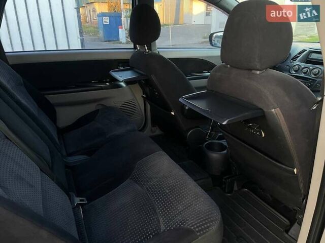 Черный Мицубиси Грандис, объемом двигателя 2.38 л и пробегом 197 тыс. км за 5299 $, фото 25 на Automoto.ua