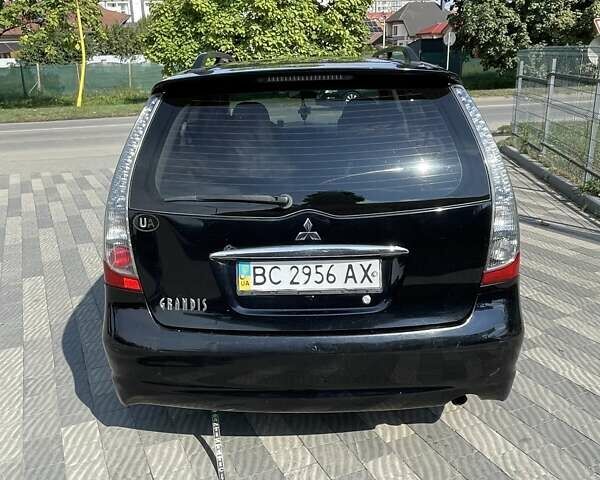 Чорний Міцубісі Грандіс, об'ємом двигуна 2.38 л та пробігом 300 тис. км за 6000 $, фото 6 на Automoto.ua