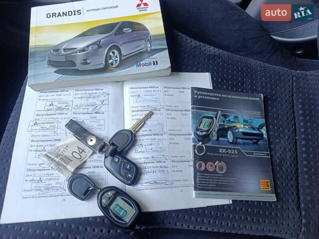 Черный Мицубиси Грандис, объемом двигателя 2.4 л и пробегом 216 тыс. км за 6300 $, фото 46 на Automoto.ua