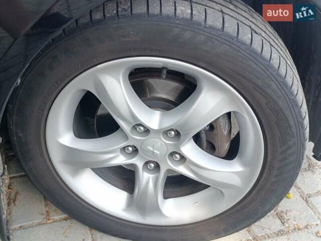 Черный Мицубиси Грандис, объемом двигателя 2.4 л и пробегом 216 тыс. км за 6300 $, фото 82 на Automoto.ua