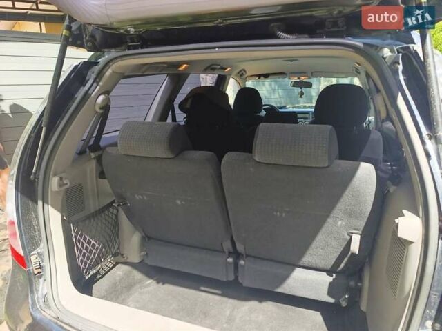 Черный Мицубиси Грандис, объемом двигателя 2.4 л и пробегом 216 тыс. км за 6300 $, фото 58 на Automoto.ua