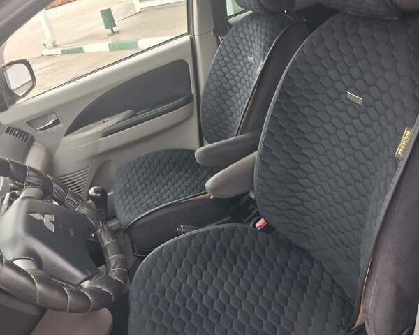 Міцубісі Грандіс 2006 у Первомайськ на Automoto.ua Чорний Міцубісі Грандіс, об'ємом двигуна 2.38 л та пробігом 220 тис. км за 6700 $, фото 3 на Automoto.ua