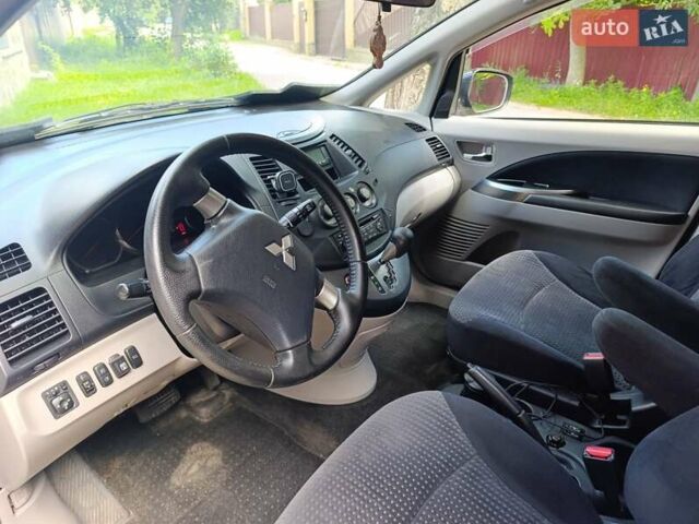 Черный Мицубиси Грандис, объемом двигателя 2.4 л и пробегом 216 тыс. км за 6300 $, фото 72 на Automoto.ua