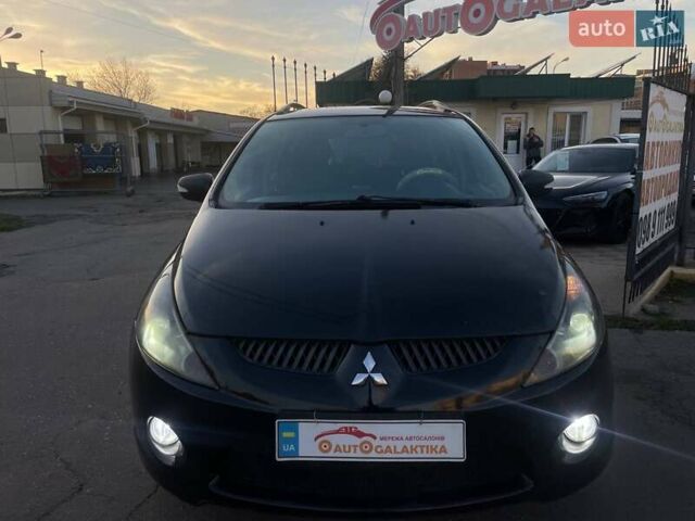 Черный Мицубиси Грандис, объемом двигателя 2.38 л и пробегом 197 тыс. км за 5299 $, фото 1 на Automoto.ua