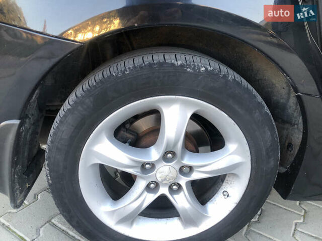 Чорний Міцубісі Грандіс, об'ємом двигуна 2.38 л та пробігом 270 тис. км за 6200 $, фото 28 на Automoto.ua