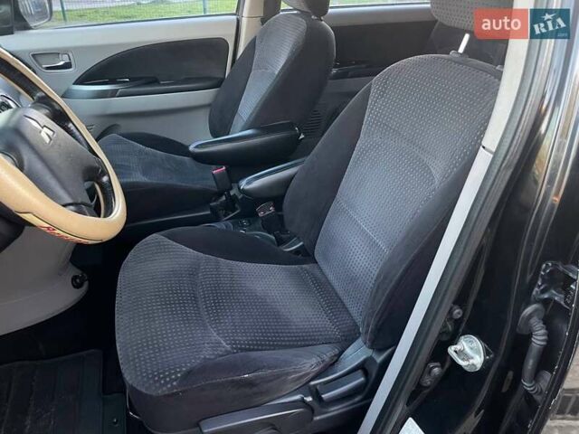 Черный Мицубиси Грандис, объемом двигателя 2.38 л и пробегом 197 тыс. км за 5299 $, фото 14 на Automoto.ua