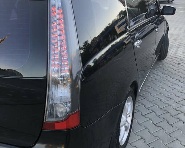 Чорний Міцубісі Грандіс, об'ємом двигуна 2.38 л та пробігом 270 тис. км за 6200 $, фото 6 на Automoto.ua