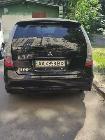 Черный Мицубиси Грандис, объемом двигателя 2.4 л и пробегом 380 тыс. км за 4400 $, фото 3 на Automoto.ua