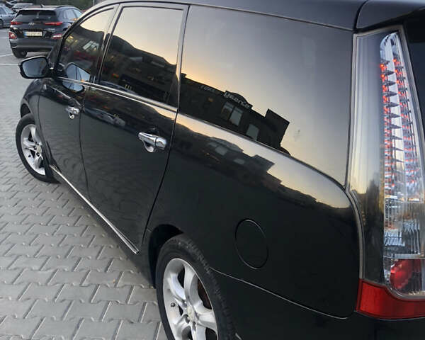Чорний Міцубісі Грандіс, об'ємом двигуна 2.38 л та пробігом 270 тис. км за 6200 $, фото 5 на Automoto.ua