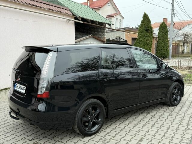 Черный Мицубиси Грандис, объемом двигателя 2 л и пробегом 222 тыс. км за 7150 $, фото 1 на Automoto.ua