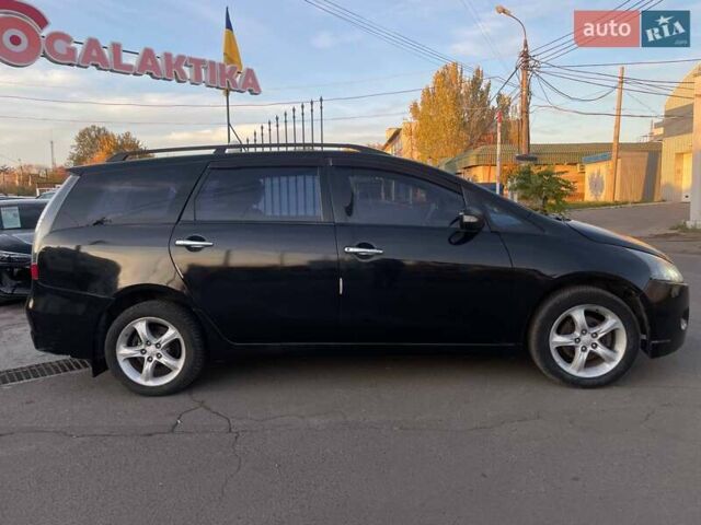 Черный Мицубиси Грандис, объемом двигателя 2.38 л и пробегом 197 тыс. км за 5299 $, фото 6 на Automoto.ua