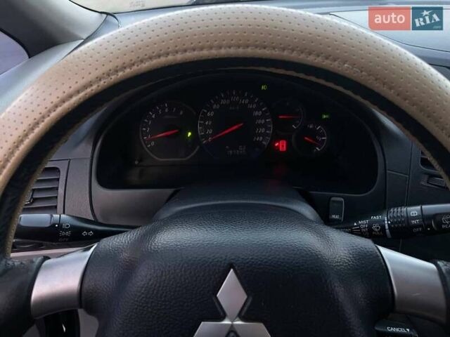 Черный Мицубиси Грандис, объемом двигателя 2.38 л и пробегом 197 тыс. км за 5299 $, фото 18 на Automoto.ua