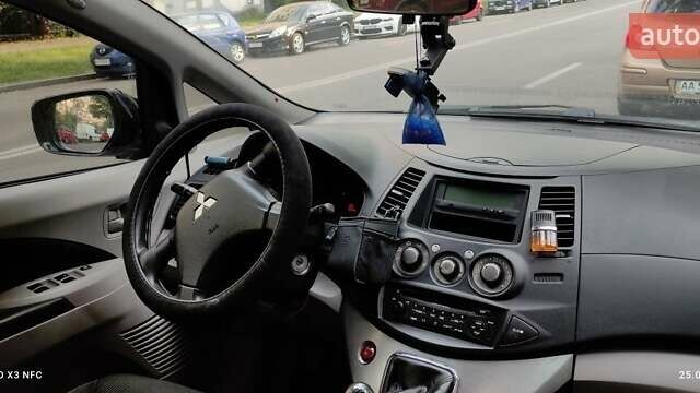 Черный Мицубиси Грандис, объемом двигателя 2.4 л и пробегом 380 тыс. км за 4400 $, фото 1 на Automoto.ua