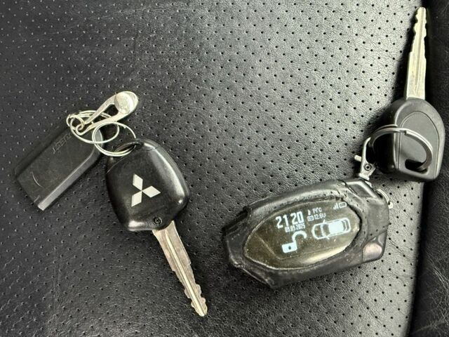 Черный Мицубиси Грандис, объемом двигателя 2 л и пробегом 222 тыс. км за 7150 $, фото 21 на Automoto.ua