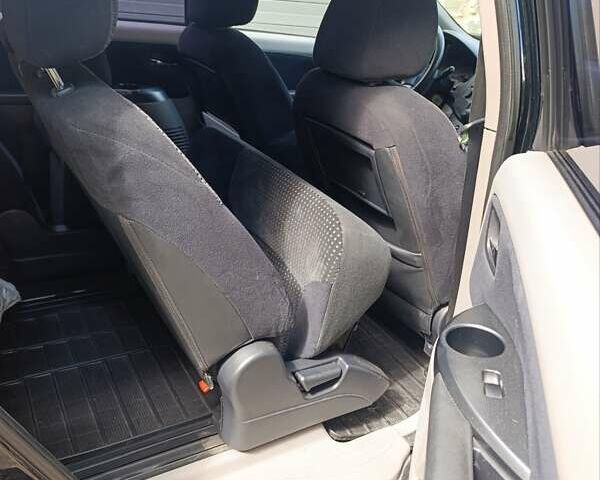 Черный Мицубиси Грандис, объемом двигателя 2.4 л и пробегом 216 тыс. км за 6300 $, фото 62 на Automoto.ua