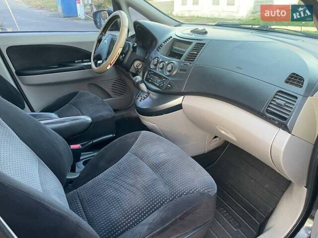 Черный Мицубиси Грандис, объемом двигателя 2.38 л и пробегом 197 тыс. км за 5299 $, фото 15 на Automoto.ua